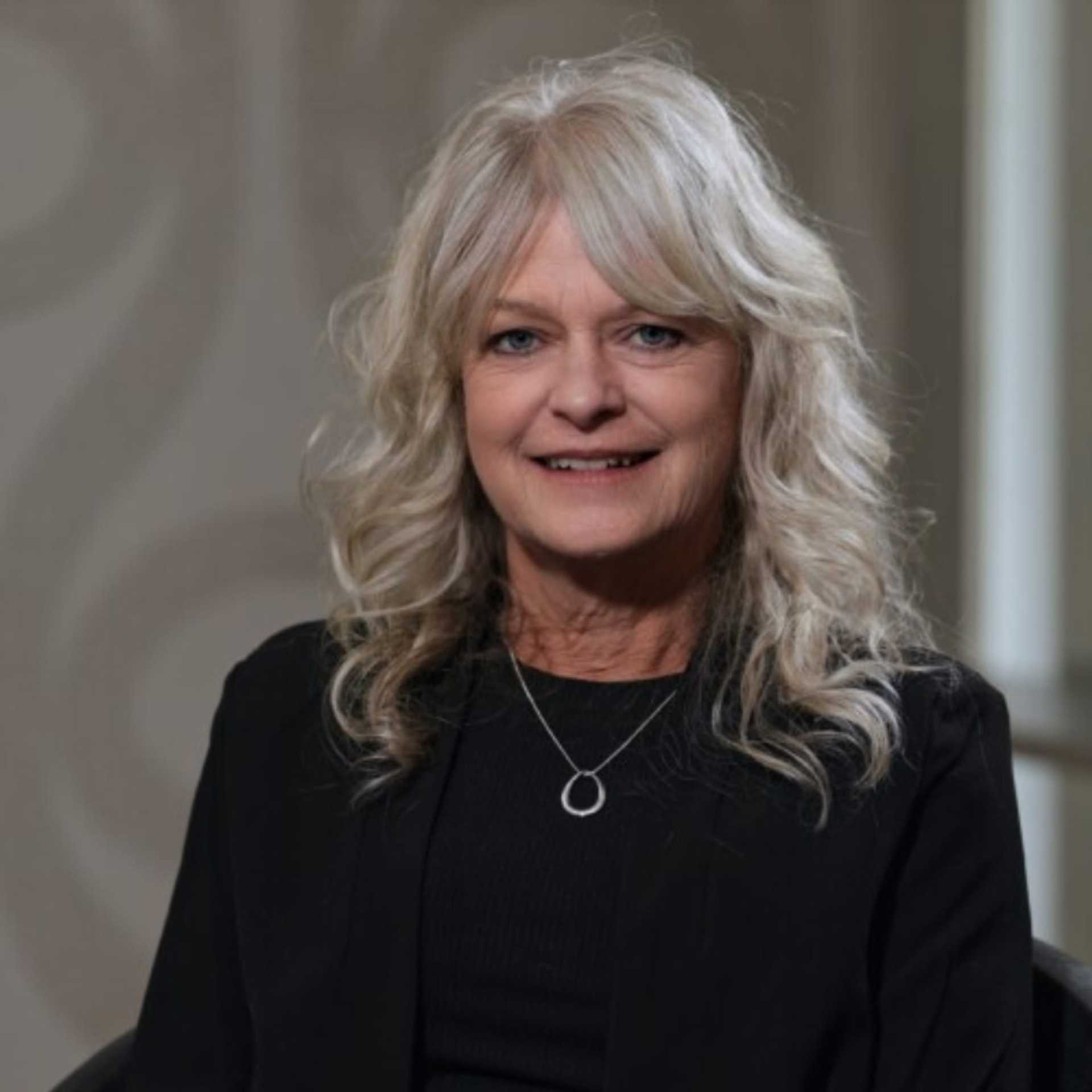 Portrait of Natalie Spangler, a professional stylist at Studio Seven, showcasing their expertise and style.