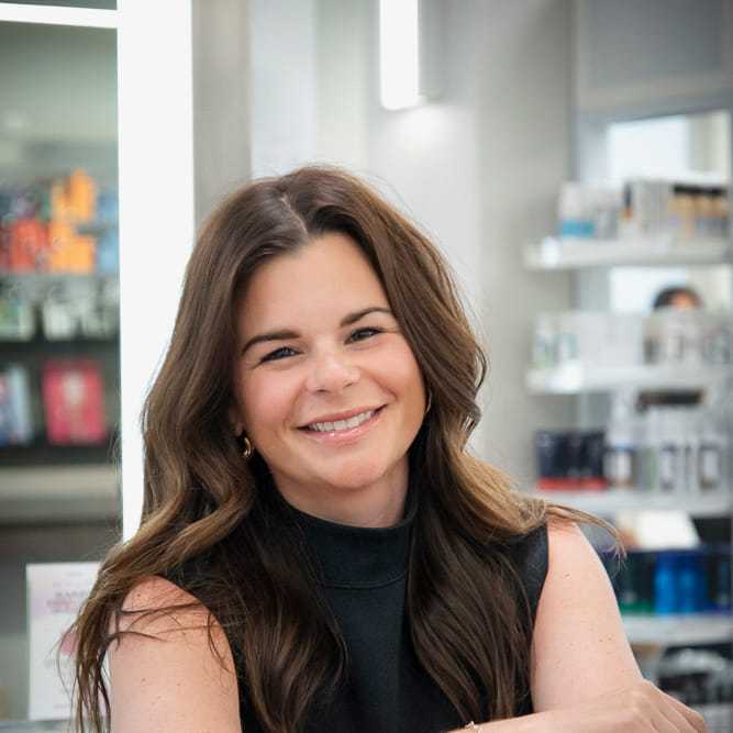 Portrait of Jill Verbosky, a professional stylist at Studio Seven, showcasing their expertise and style.