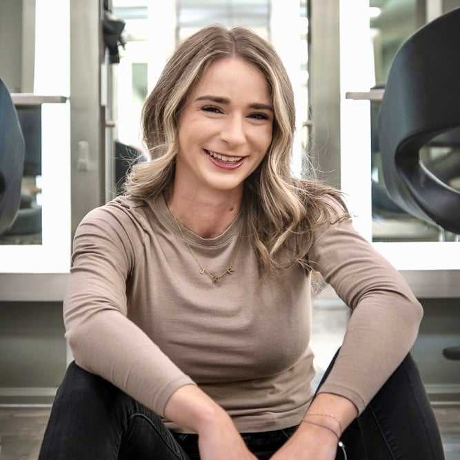 Portrait of Madison Provenzano, a professional stylist at Studio Seven, showcasing their expertise and style.